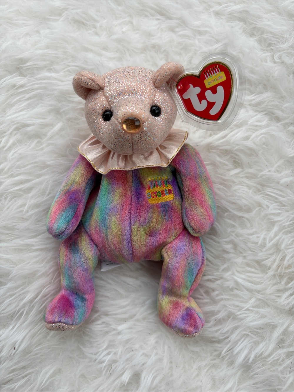 Ty Multicolor Rainbow Plush Bear with October birthstone Pink Glitter Head